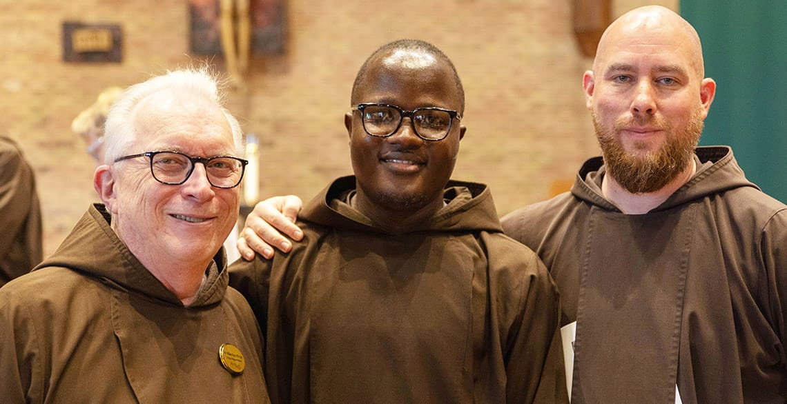 Friar Arnaud Dadjo, OFM Cap. (center) with Provincial Vicar Bill Hugo, OFM Cap. (L) and Igor De Bliquy, OFM Cap. (R).