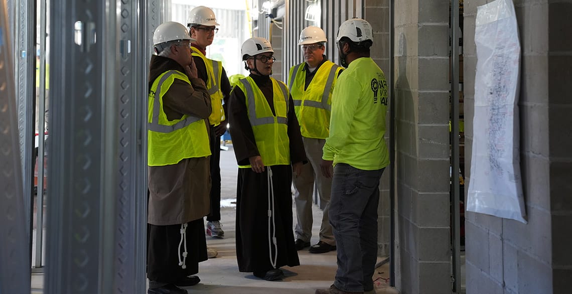 Fr. Mark Joseph Costello, OFM Cap., Br. David Hirt, OFM Cap. and Fr. Zoy Garibay, OFM Cap. take a hard-hat tour of Blessed Solanus Casey Hall at St. Lawrence Seminary. Photo Credit: Kevin Buelow/St. Lawrence Seminary